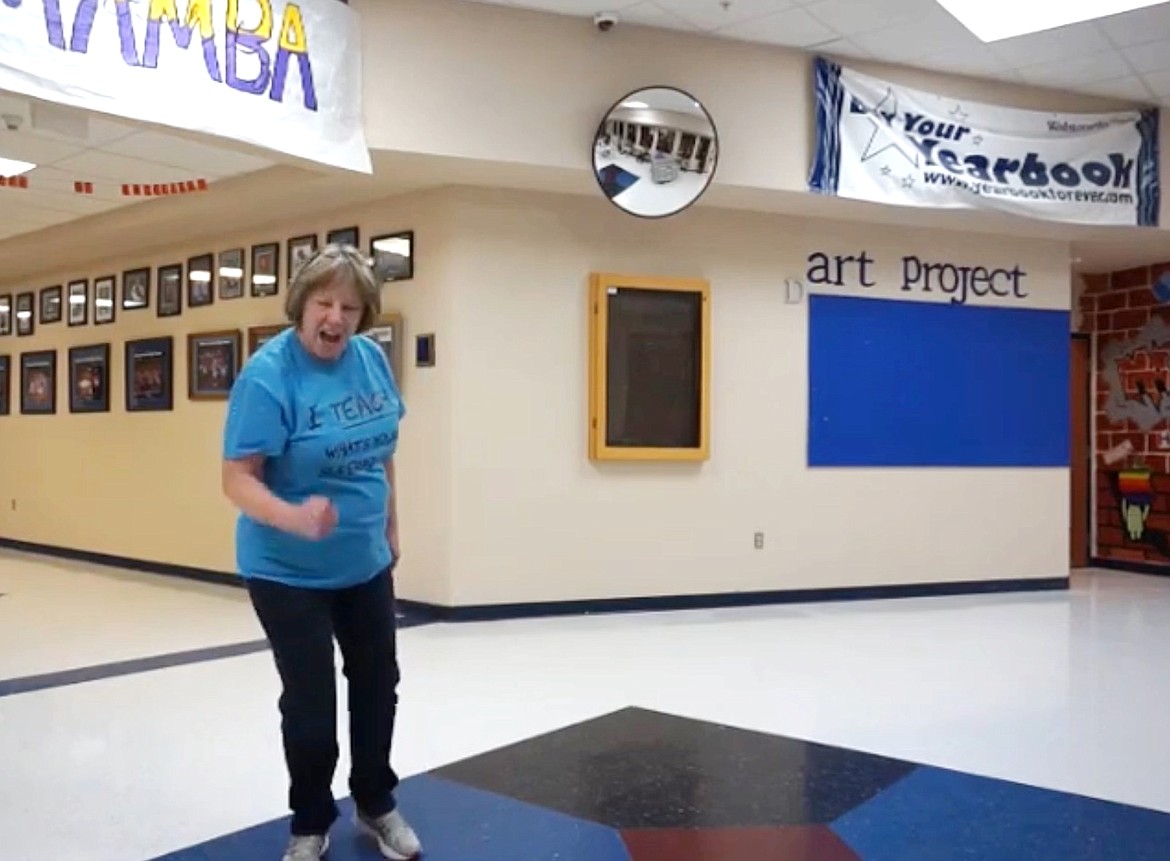 (Screenshot courtesy PAUL BONNELL/BONNERS FERRY HIGH SCHOOL)
Bonners Ferry High School’s Diane Niewieroski performs to a ‘70s song in one of three lip-sync videos the staff created to let students know they were thinking about them.