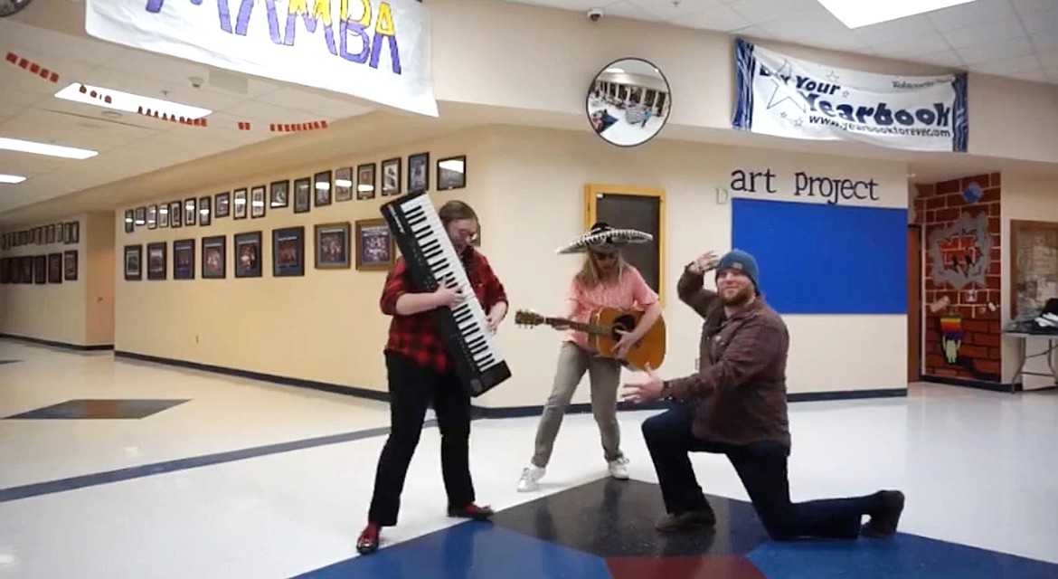 (Screenshot courtesy PAUL BONNELL/BONNERS FERRY HIGH SCHOOL)
In a screenshot from one of Bonners Ferry High School’s lip-sync videos, trio Bailey Cavender (keyboard), Jessica Vineyard (guitar), and Josh Knaggs performs.