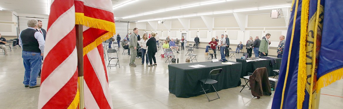 BILL BULEY/Press 
 Members of the Kootenai County Republican Central Committee meet at the Kootenai County Fairgrounds Wednesday to select three nominees for Kootenai County commissioners. The committee picked Bjorn Handeen, Bela Kovacs and Roger Garlock.