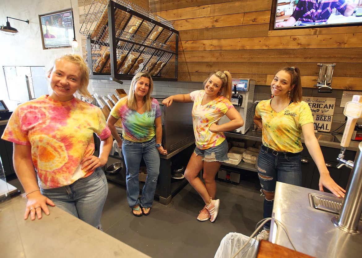 BILL BULEY/Press 
 The crew at Rustic, from left, Hailee Duval, owner Deb Heit, Jayden Vasser and Dejah Wilson, are happy to be working Saturday.
