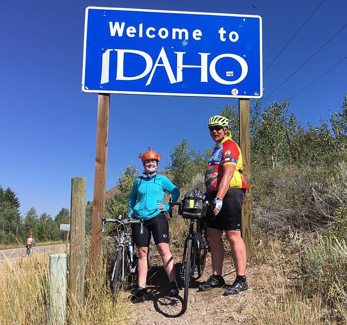Lakeland High School grad Sarah Mitchell and her dad, Doug Park, of Rathdrum, both have a penchant for computer science, but they bond over bicycling. They're seen here on one of their Idaho adventures. (Courtesy photo)