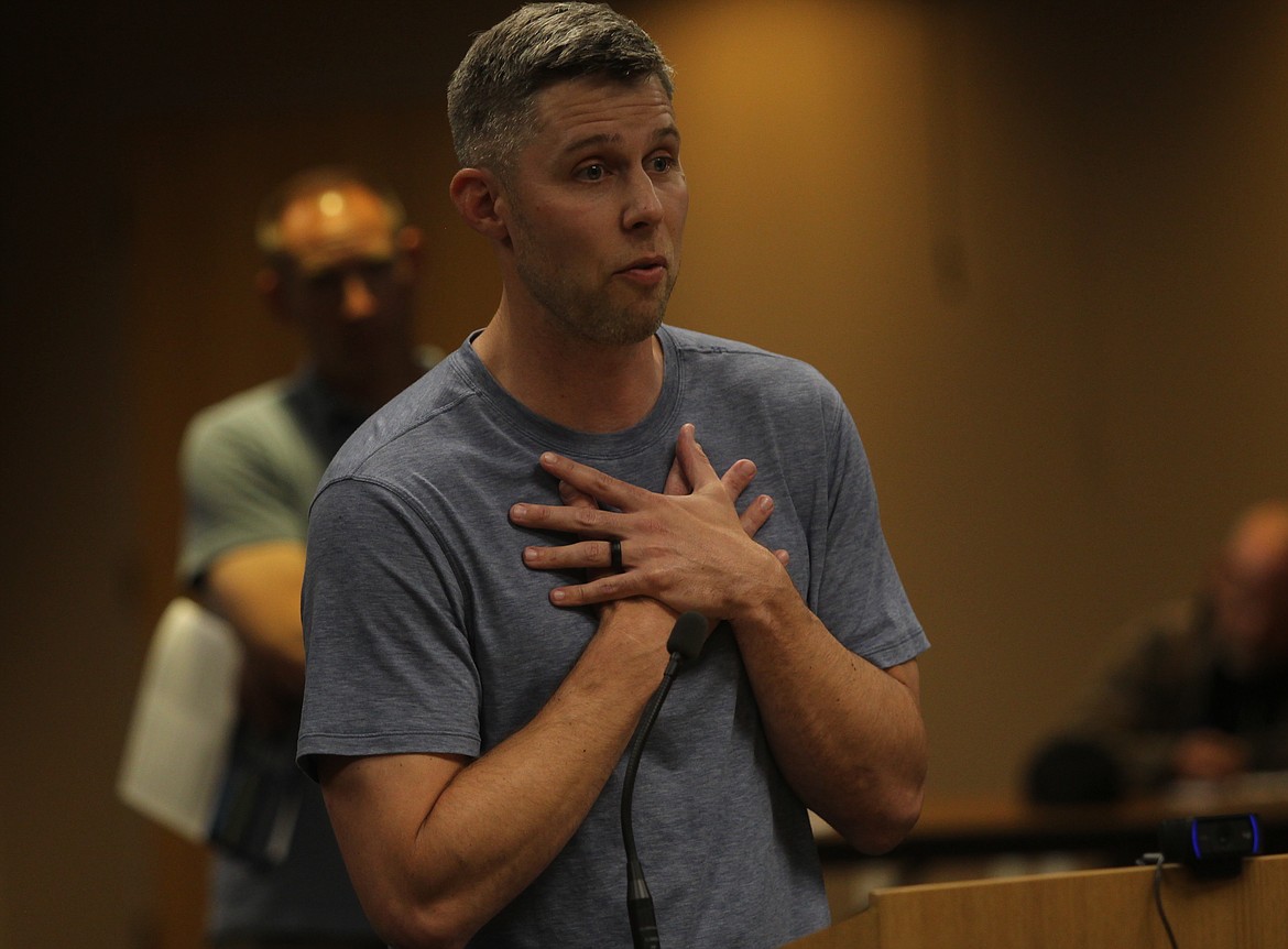 At a Tuesday night meeting, wake boater Casey Price gives an empassioned plea to county commissioners to maintain the status quo on wake boat rules on the Spokane River where he lives and recreates.