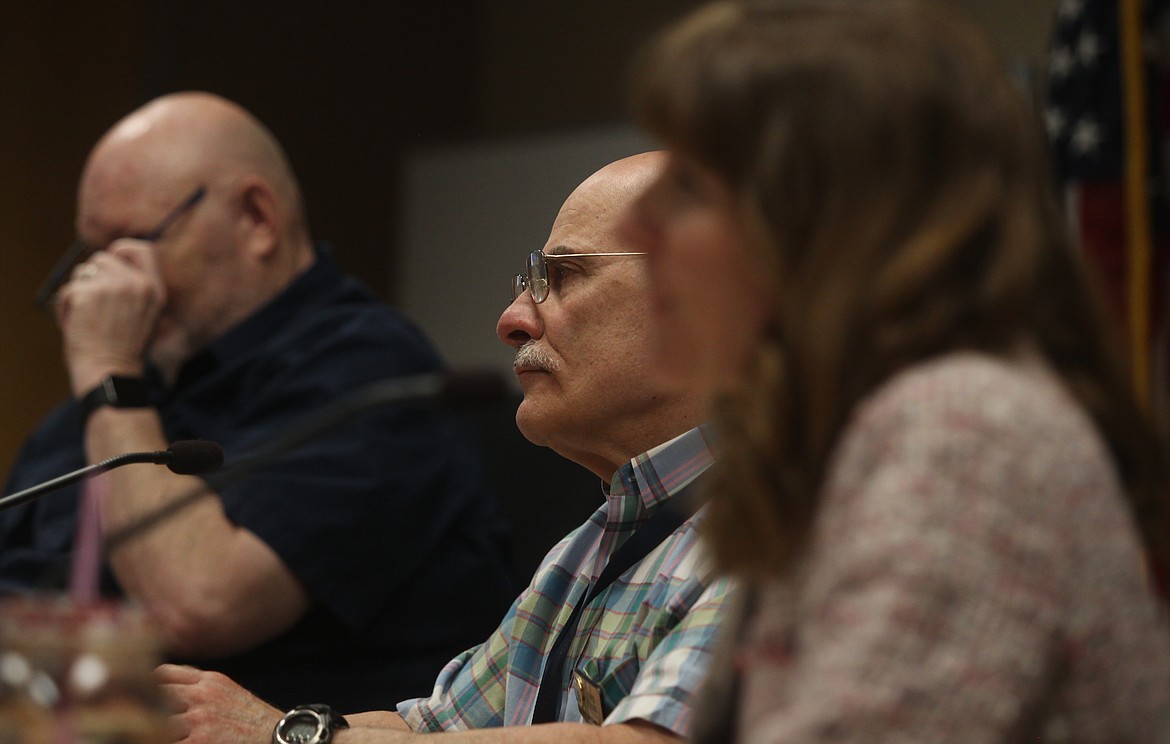 County commissioners, Bill Brooks (from left) Chris Fillios and Leslie Duncan listen to in-person public testimony Thursday at a hearing regarding wake boats in the county. 
  
 RALPH BARTHOLDT/Press