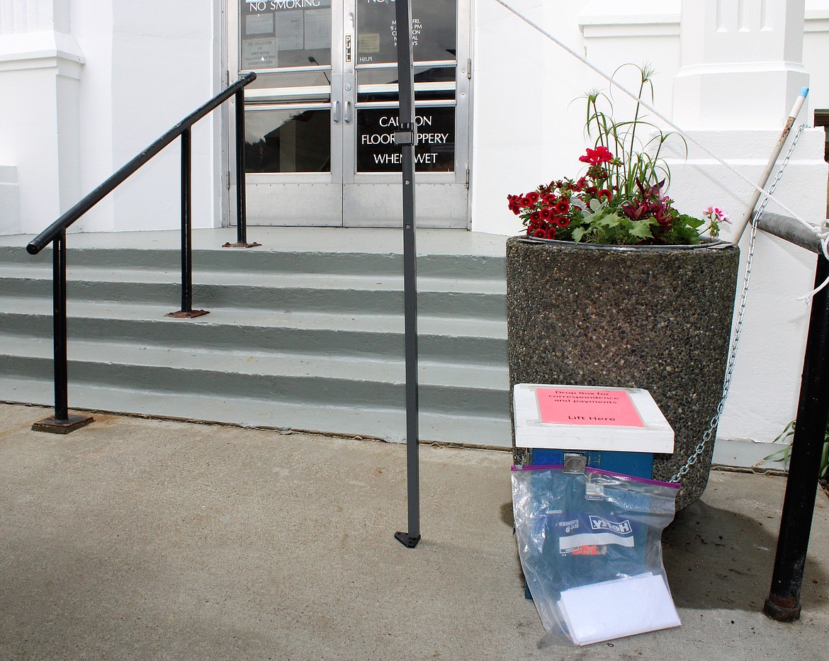 The Boundary County Courthouse has dedicated a metal box, chained to the trash receptacle, for voters to deliver their mail in ballots directly to the county clerk. Voters have until June 2 to return ballots to the clerk, either by mail or this ballot box.