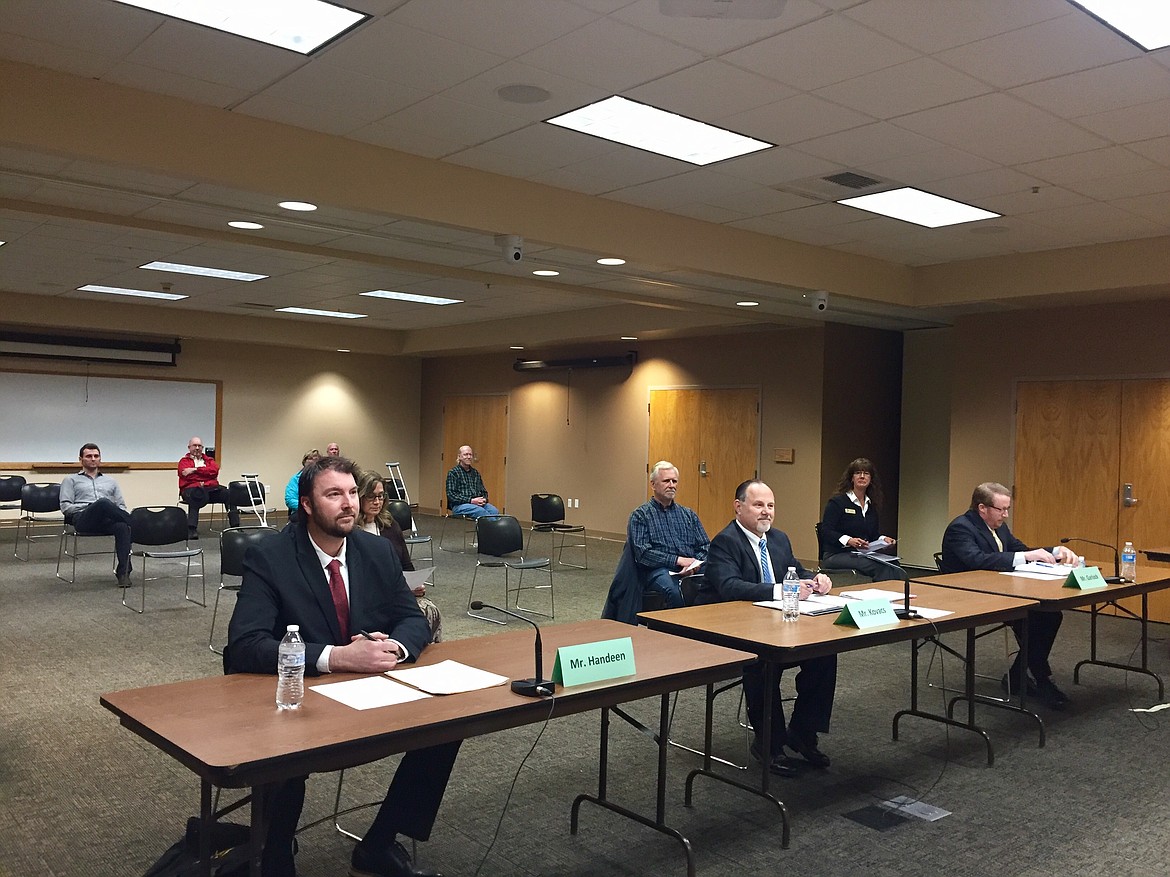 Bjorn Handeen, Bela Kovacs, and Roger Garlock wait to be interviewed by the Board of County Commissioners to replace the late assessor Rich Houser. (JENNIFER PASSARO/Press)