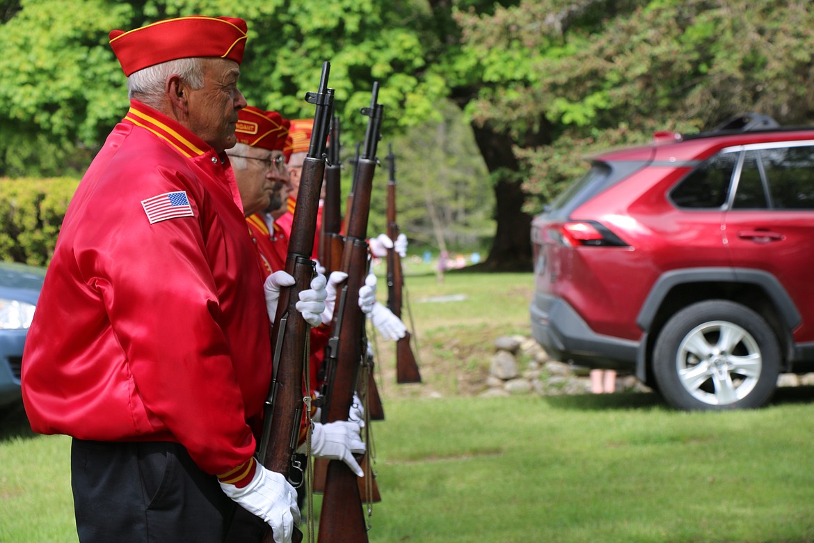 (Photo by CAROLINE LOBSINGER) 
 Members of the Marine Corps League stand at attention at Monday's Memorial Day tributes in Sandpoint.