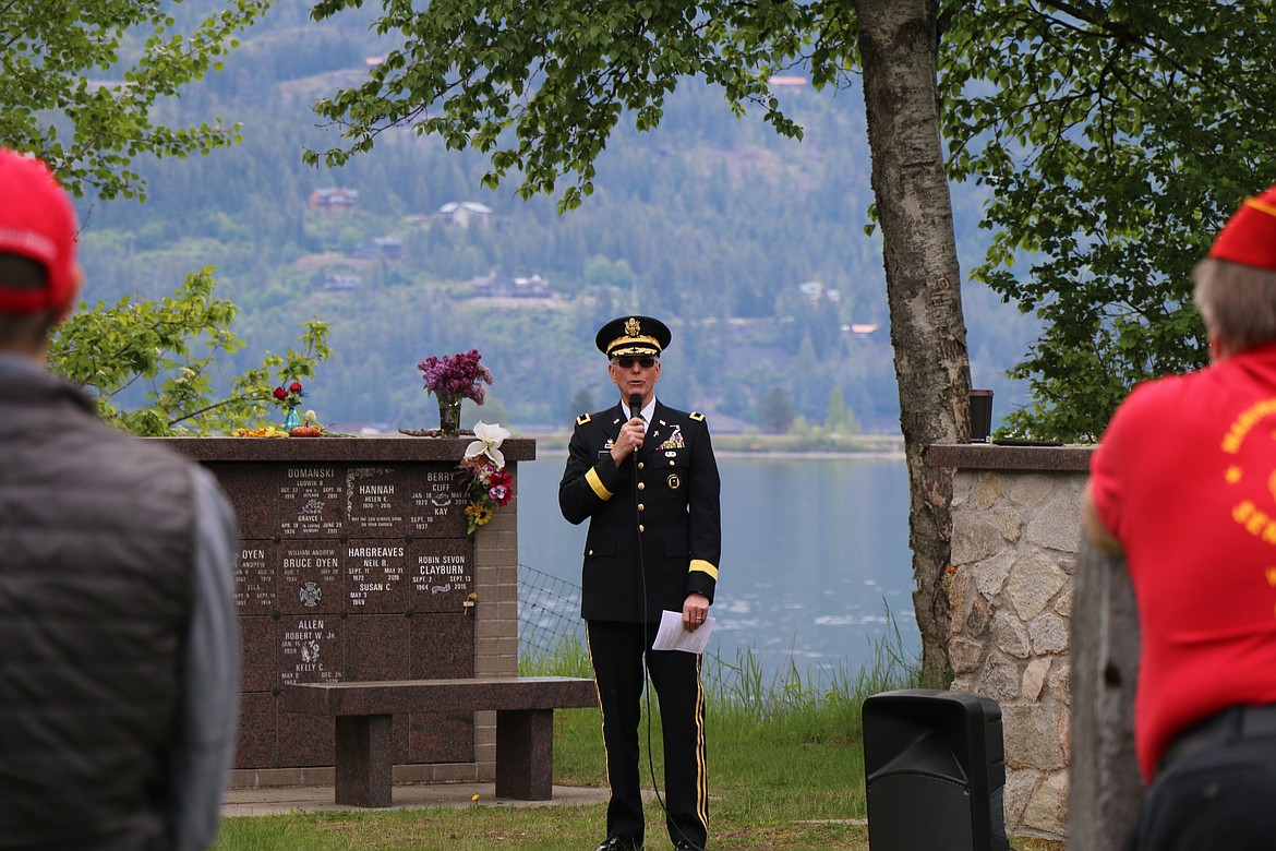 (Photo by CAROLINE LOBSINGER) 
 Bryan Hult, a retired U.S. Army brigadier general and Bonner County Veterans Services officer, speaks about the importance of Memorial Day at Monday's tribute at Lakeview Cemetery in Sandpoint.