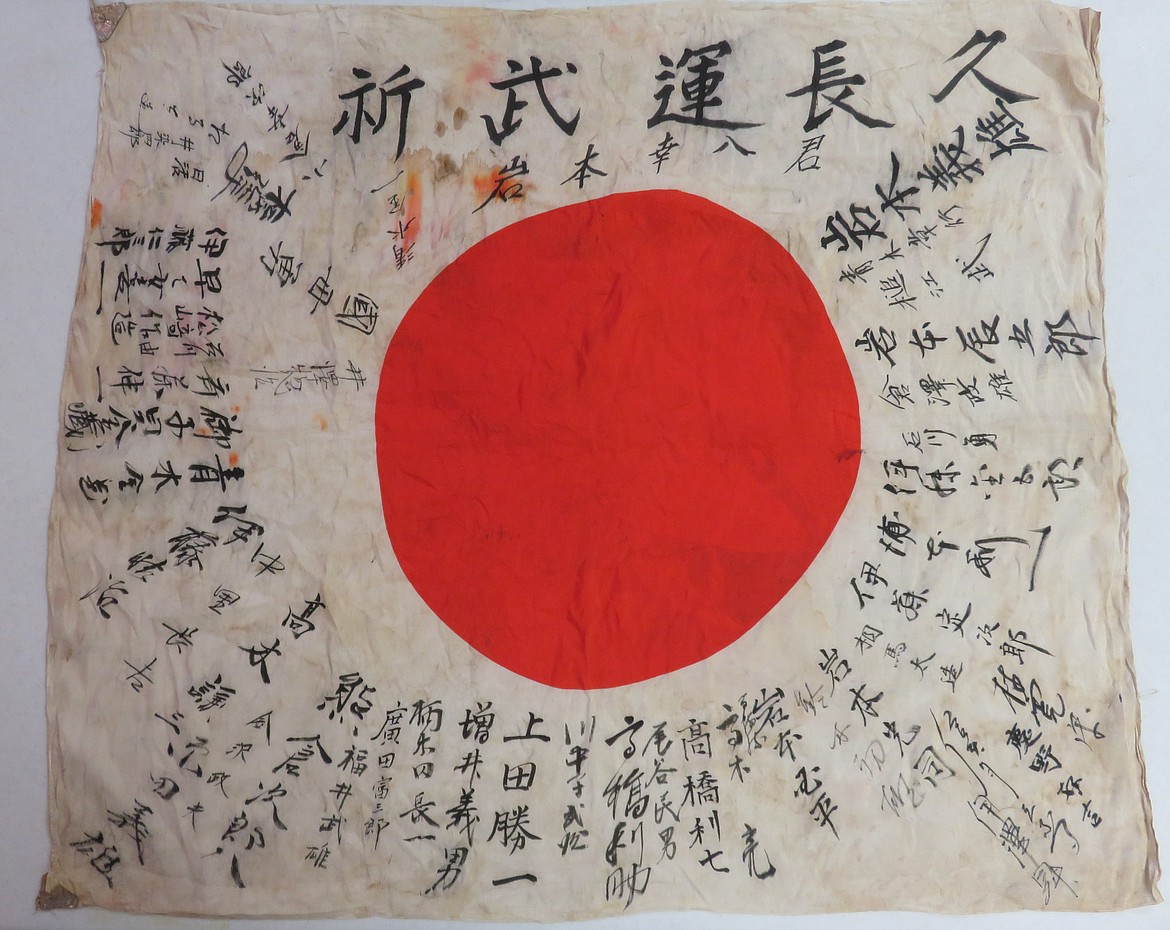 The flag of deceased Japanese soldier Takeji Kubota was among flags that the Lloyd G. McCarter American Legion Post 25 of St. Maries  received from Carol Koebel more than a year ago. The Obon Society has not found Kubota's family members. 
  
 Courtesy photo