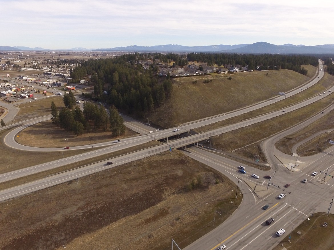 An early photo of the I-90, ID-41 interchange west of Coeur d'Alene has seen an increase in congestion as the county population climbs. A virtual public meeting regarding the design for a new interchange is availble online until June 18th. (Photo Courtesy of ITD)
