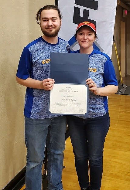 Classical Christian Academy junior Nathan Bossé and his robotics teacher Deanna Finley celebrate his accomplishment of earning a Dean's List Award, a coveted, rare honor in the world of FIRST (For Inspiration and Recognition of Science and Technology) Robotics. (Courtesy photo)