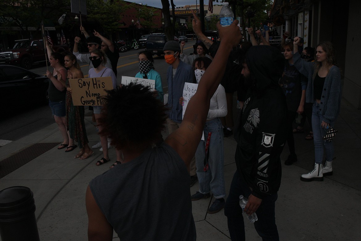 Joseph Pleasant of Coeur d’Alene leads a group of Black Lives Matter supporters in chants Tuesday on Sherman Avenue.
RALPH BARTHOLDT/Press