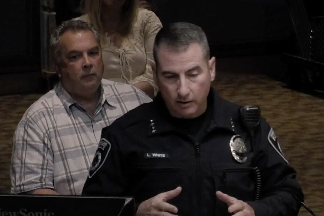 Coeur d'Alene Streets and Engineering director Tim Martin (left) listens as Police Chief Lee White (center) details his concerns about closing or narrowing Sherman Aveune. Both city employees aired their reservations to the proposals Tuesday night that were eventually voted down by city council. (Courtesy of CDA TV)