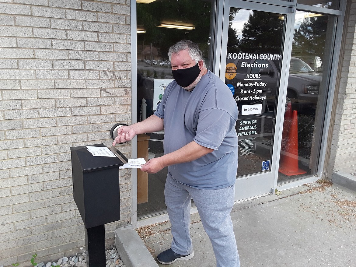 Andreas Braunlich cast his vote outside the Kootenai County Elections Office on Third Street in Coeur d'Alene Tuesday evening. His vote was of 32,800 cast in this year's all-absentee primary. (CRAIG NORTHRUP/Press)