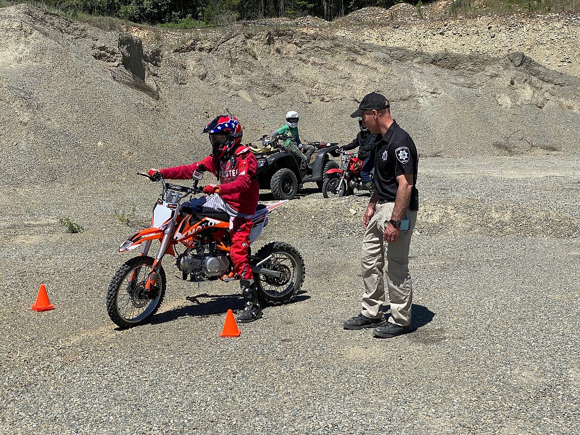 A young rider gets some tips and they make their way through a off-highway vehicle taught by the Boundary County Sheriff’s Office.