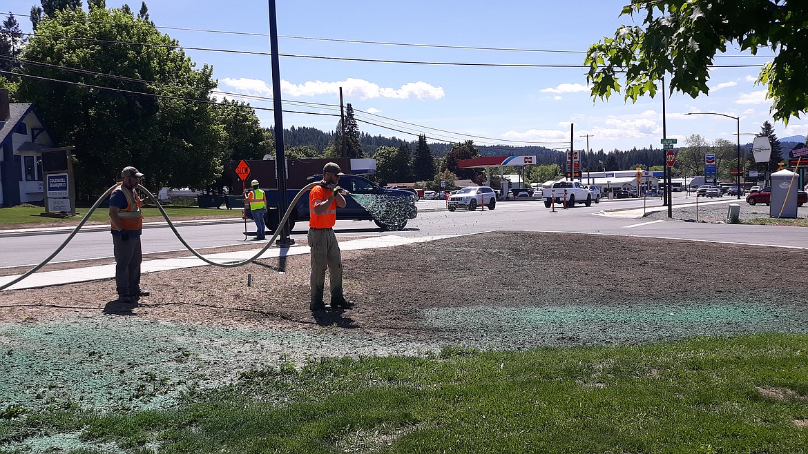 Idaho Transportation Department crews put the finishing touches on landscaping for the Highway 95 reconstruction project in Bonners Ferry.