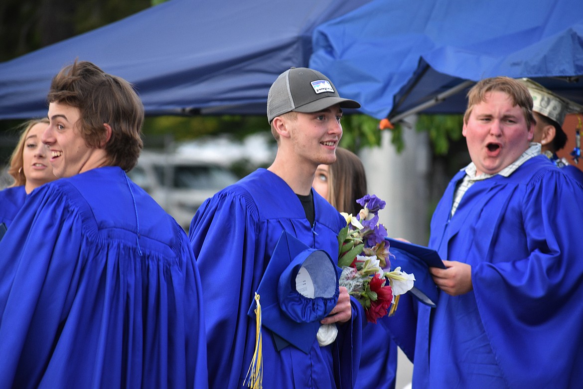 (Photo by DYLAN GREENE) 
 Clark Fork students celebrate after graduation.