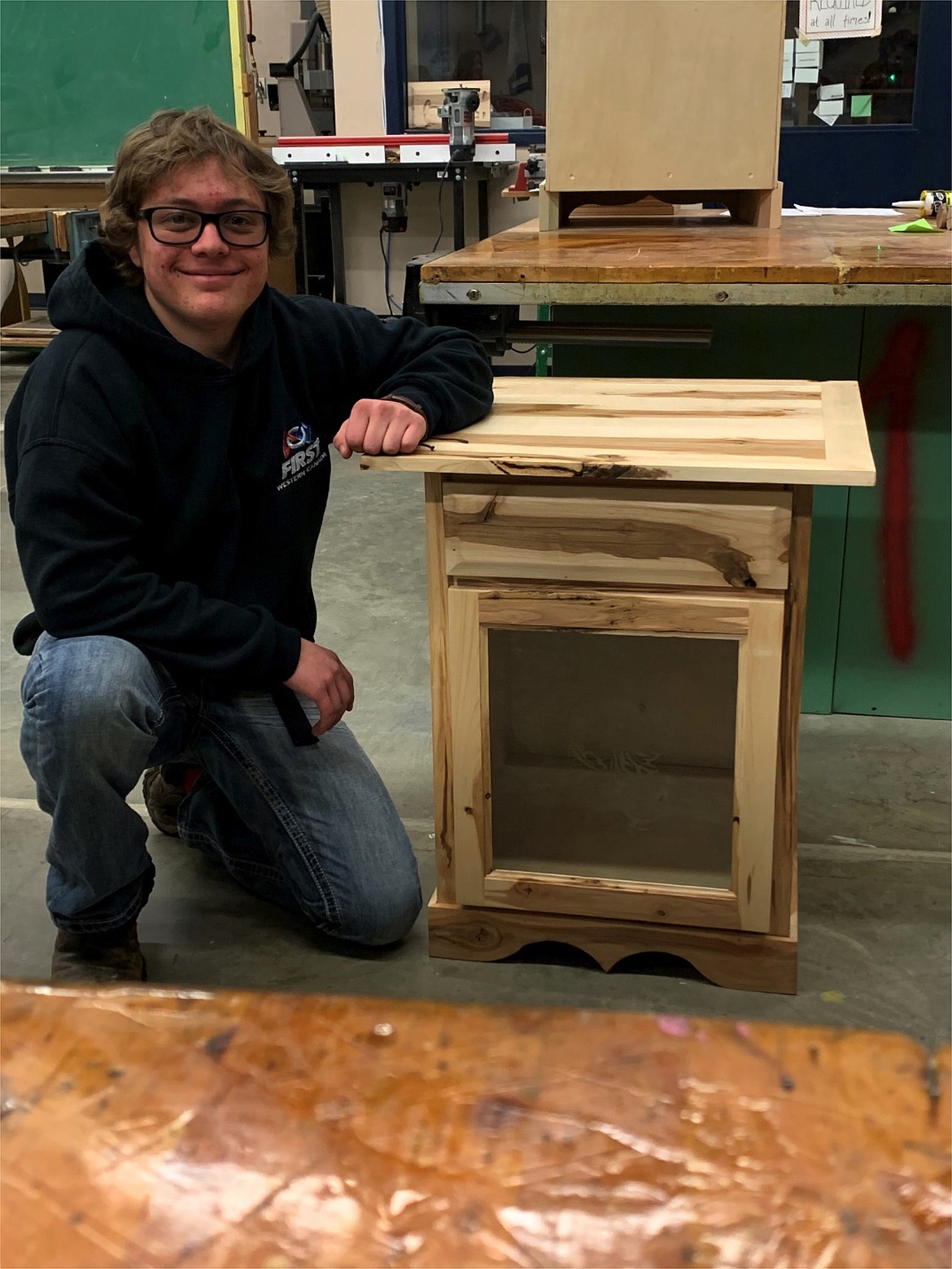 Cameron Rae (senior) and his first semester cabinet project.