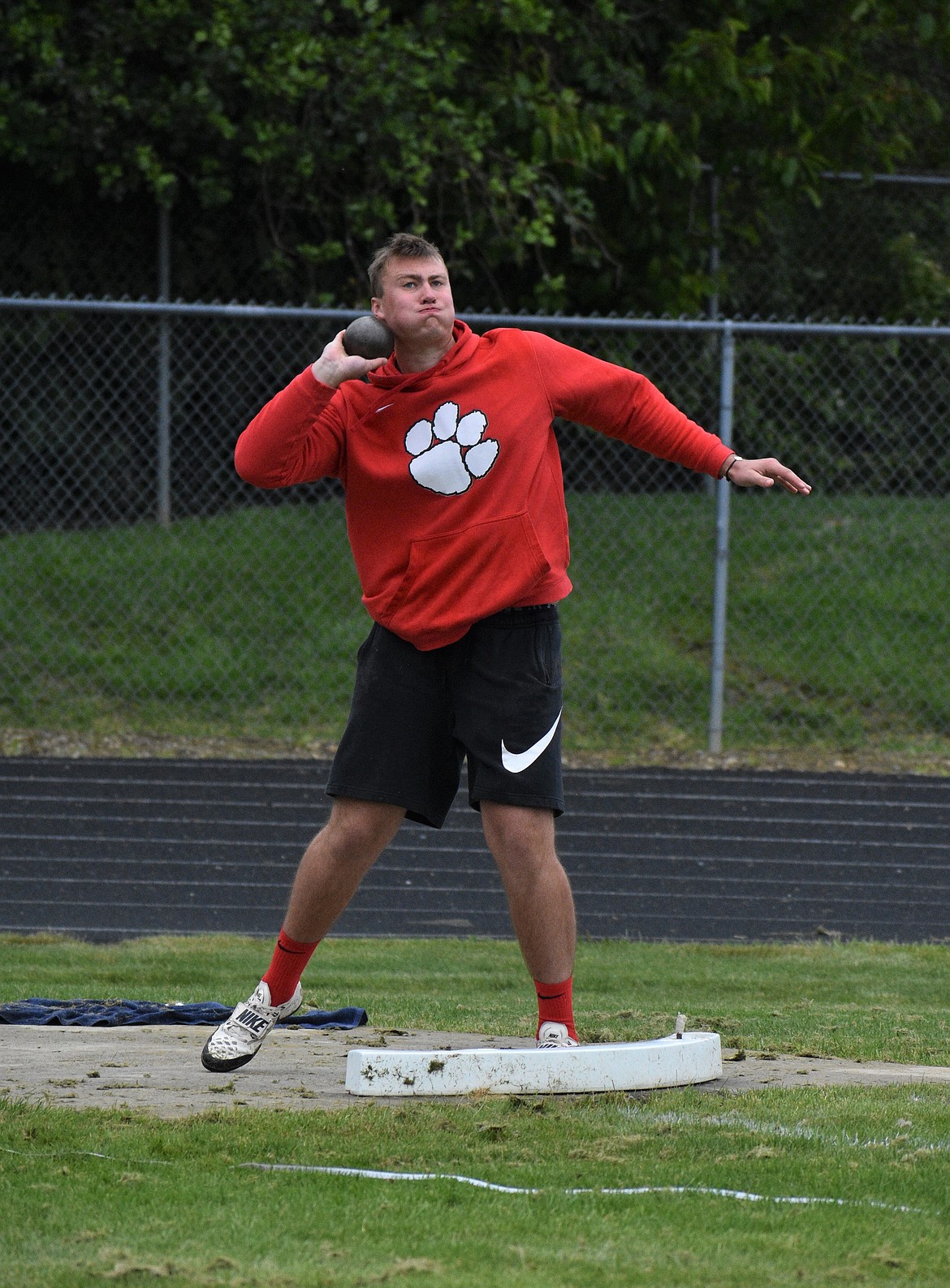 DYLAN GREENE/Bonner County Daily Bee 
 Sandpoint senior Brandon Casey winds up to throw the shot put on Saturday. He won the boys shot and discus.