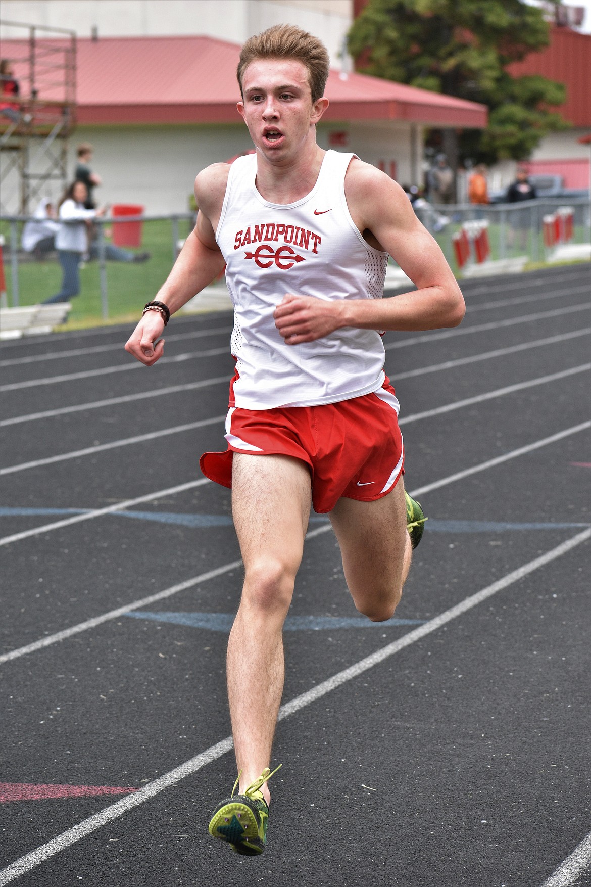 (Photo by DYLAN GREENE) 
 Senior Gabe Christman nears the finish line in the boys 3,200 meter Saturday.