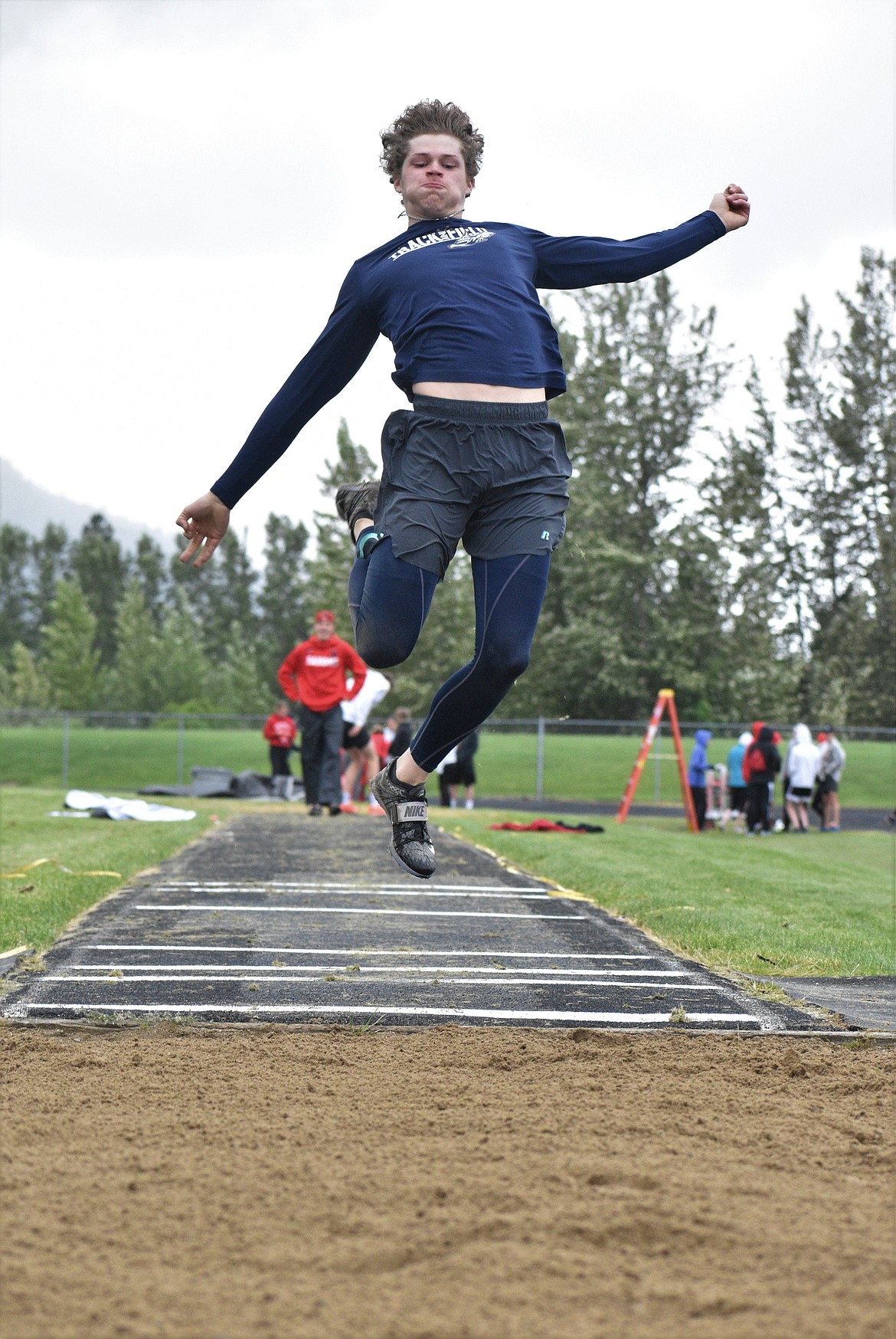 DYLAN GREENE/Bonner County Daily Bee
Timberlake’s Ian Gardom competes in the triple jump on Saturday.