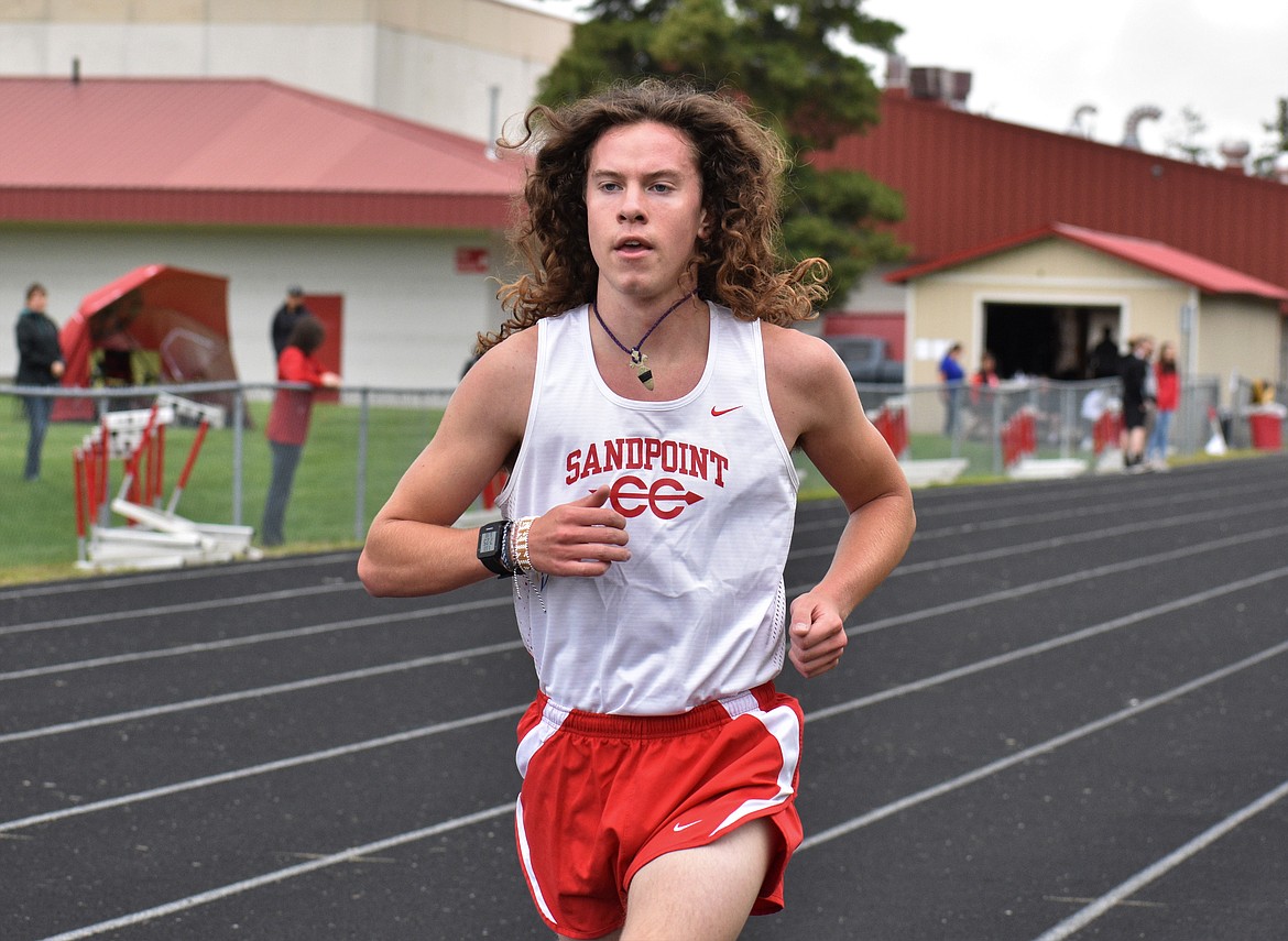 (Photo by DYLAN GREENE) 
 Junior Jett Lucas ran a PR in the boys 3,200 meter Saturday.