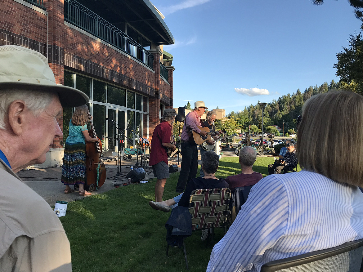 Spring Tonic gets the crowd grooving during an outdoor concert at the Coeur d’Alene Library on Aug. 12, 2019. The Outdoor Summer Concert Series will return for the summer starting Monday.