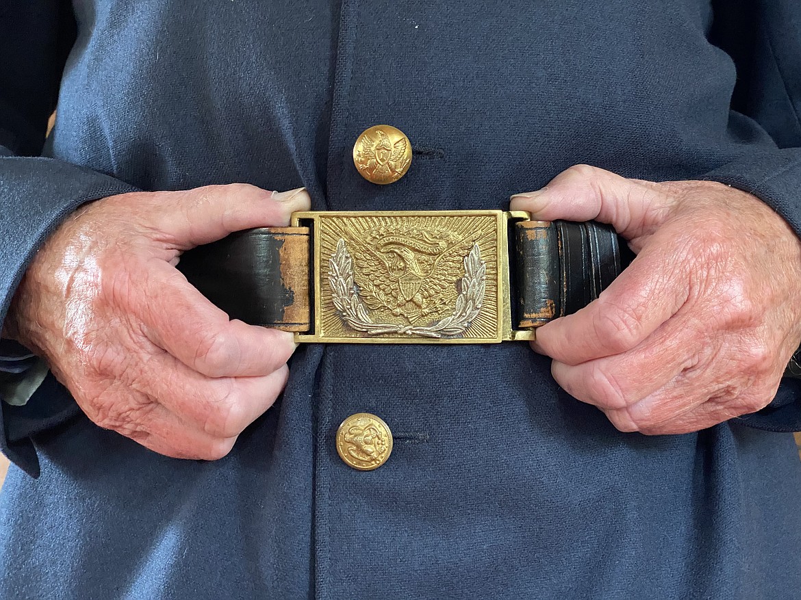 Local historian, Robert Singletary, shows off his historic military uniform on Tuesday. Singletary and the Museum of North Idaho will begin walking tours for the season today. (MADISON HARDY/PRESS)