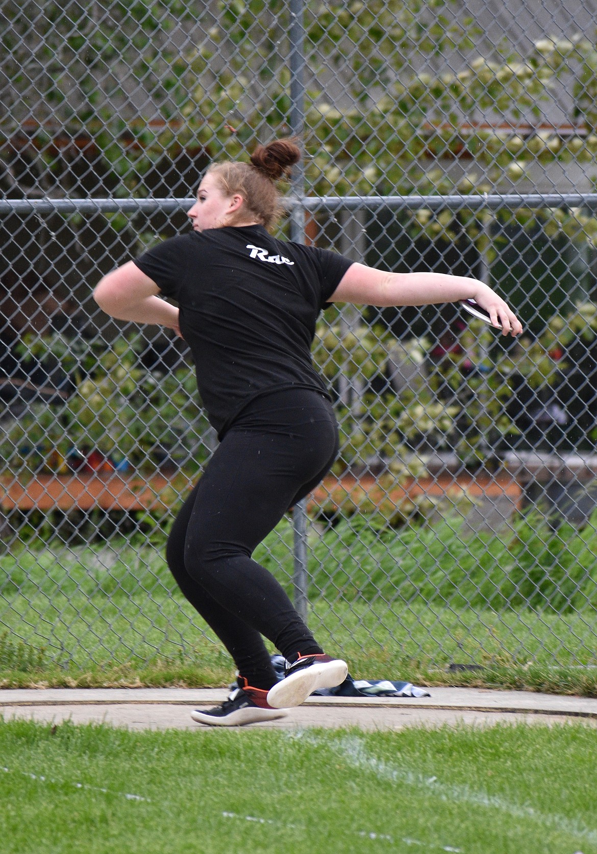 Bonners Ferry senior Victoria Rae winds up to throw the discus during Saturday’s Sandpoint Open. Rae swept the girls discus and shot put events at the meet.