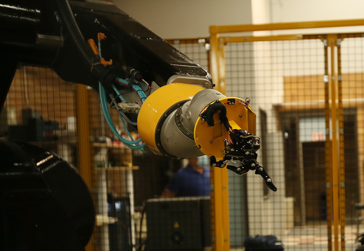 This 800-pound, $450,000 FANUC robot was donated by Boeing to the University of Idaho Coeur d'Alene's computer science program to be used as a teaching tool. It is housed in the Venture Center on the North Idaho College campus. (DEVIN WEEKS/Press)