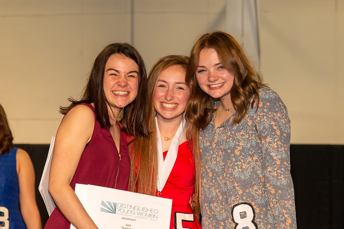 (Photo courtesy VAN SINDEREN PHOTOGRAPHY) 
 Camille Neuder, center, and Autumn Morgan get their picture taken at the 2020 Sandpoint Distinguished Young Woman program in March. Neuder was named the Distinguished Young Woman and Morgan was named second finalist.