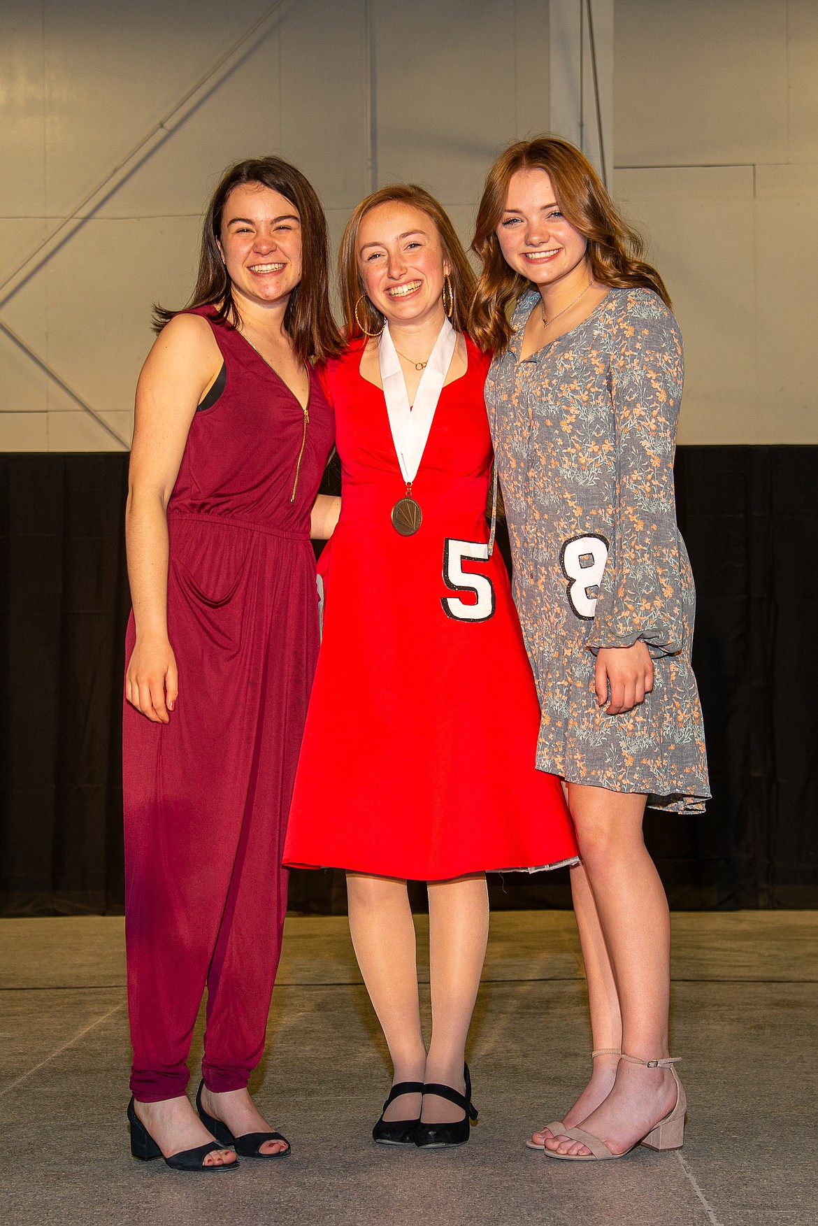 Camille Neuder, center, and Autumn Morgan get their picture taken at the 2020 Sandpoint Distinguished Young Woman program in March. Neuder was named the Distinguished Young Woman and Morgan was named second finalist.