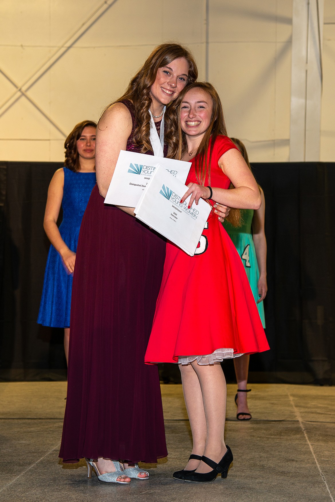 Libby McLaughlin and Camille Neuder get their picture taken at the 2020 Sandpoint Distinguished Young Woman program in March. Neuder was named the Distinguished Young Woman and McLaughlin was named first finalist.