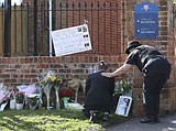 English town mourns victims of suspected terror attack