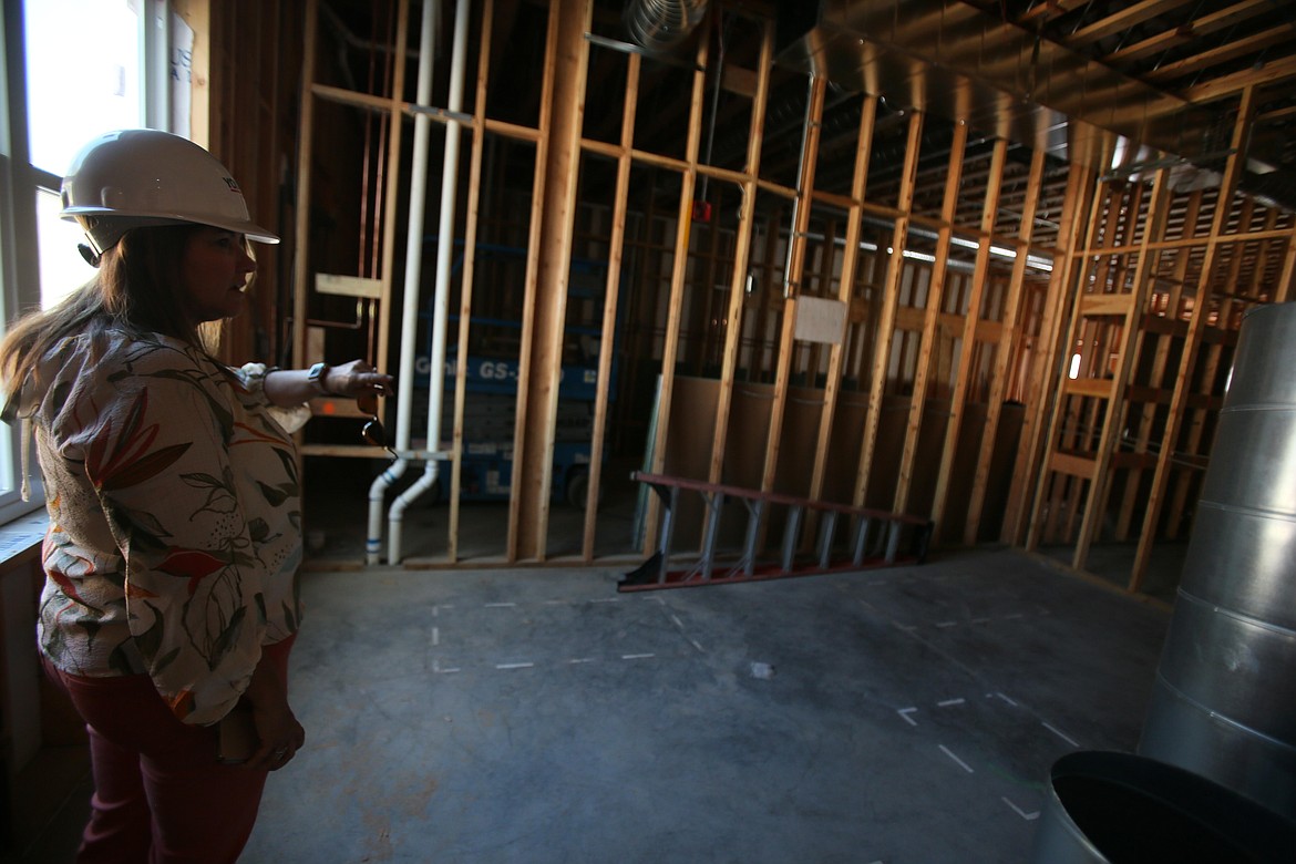 Cynthia Lamb, education director for Hayden Canyon Charter, shows where offices and conference rooms will be on the administrative side of the new school during a tour Tuesday. The school is set to open Sept. 8.