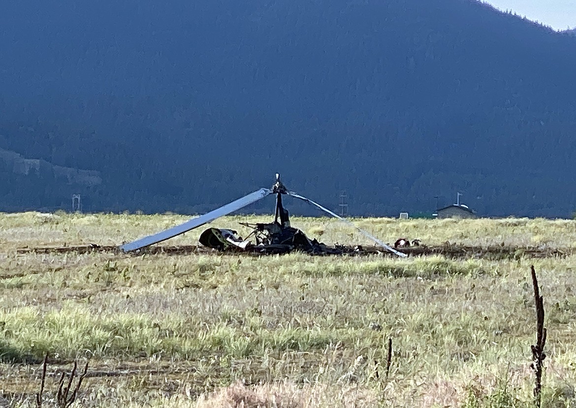 MADISON HARDY/Press 
 The remains of a helicopter that crashed in a field off Highwayt 41 and Wyoming Tuesday evening.