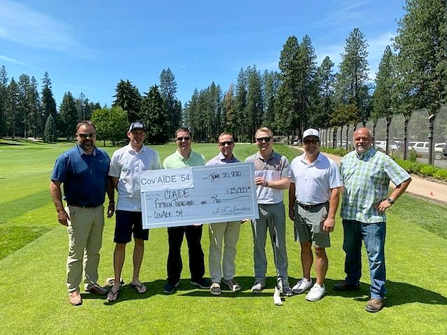 The inaugural COV’AIDE Invitational brought in $15,000 for CDAIDE, a local nonprofit that serves workers in the service and hospitality industries. Here are the players and a CDAIDE representative at the Hayden Lake Country Club, one of three courses to host the event. From left: Dustin Ainsworth, Mike Schwagler, Taylor Fore, Ryan Deschryver, Danny Beutler, Jason Kelly and CDAIDE’s Doug Johnson. Not pictured: Greg Rowley and Scott Kramer.