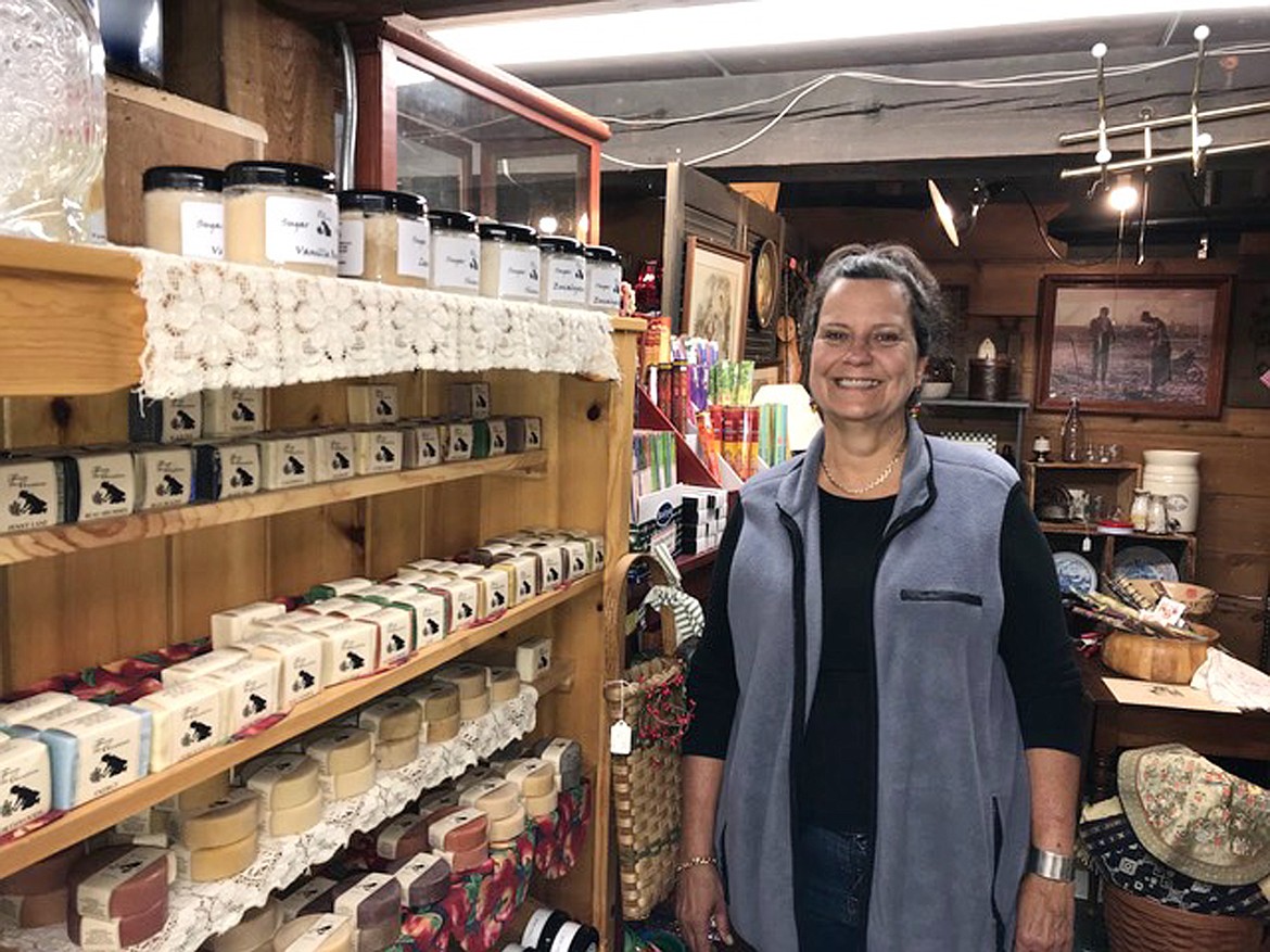 (Photo by SUSAN DRINKARD)
Kim Spencer has been making soap for more than two decades in Sandpoint. She has developed a new product—Scat Gnat—an insect repellant for horses, popular with farriers, veterinarians, and ranchers. Her products are available downstairs at the Foster’s Crossing.