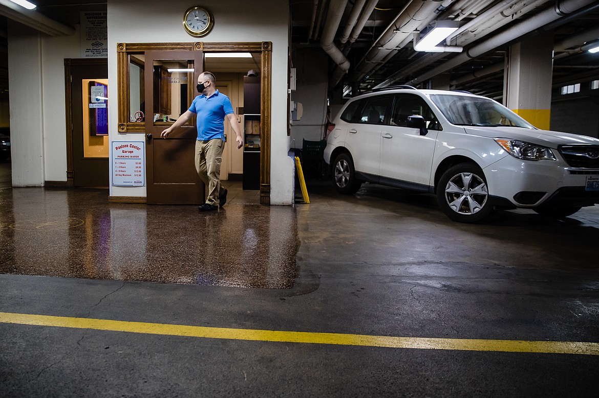 Sergey Lunin exits his valet office in-between customers in the Paulsen Center garage.