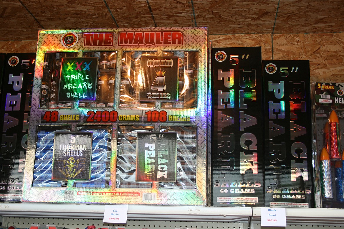 Fireworks fill the shelves of a stand operated by the Sand Scorpions off-road vehicle club.