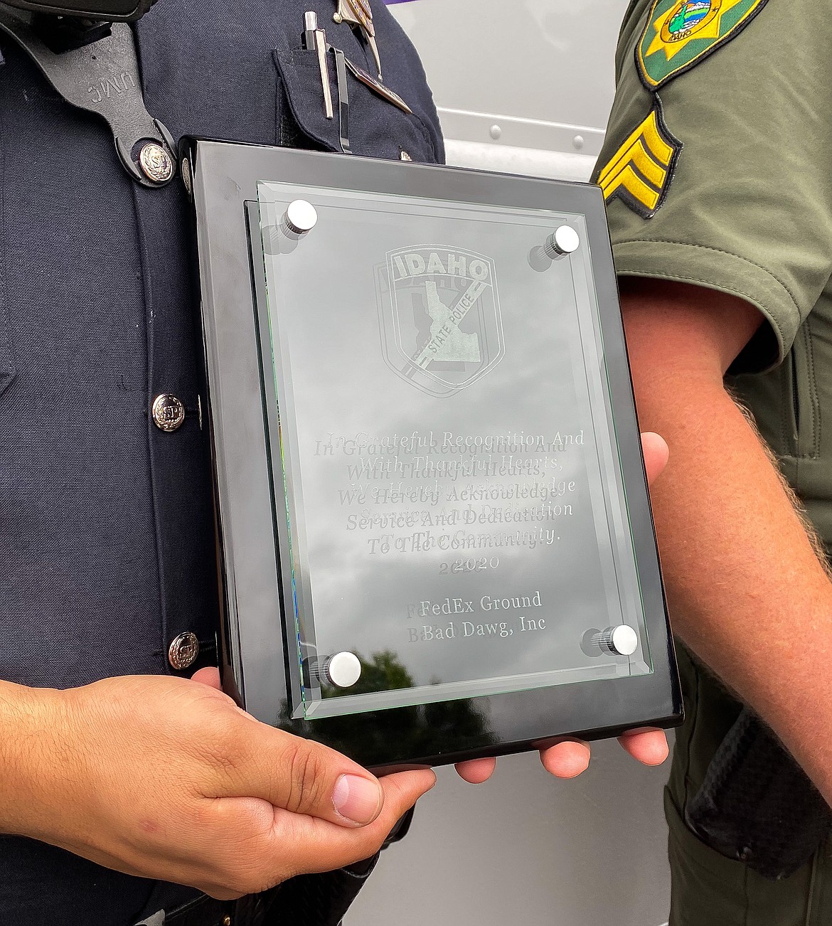 Close up of plaque gifted by Bad Dawg Inc. with personalized engraving for law enforcement agencies. (MADISON HARDY/Press)