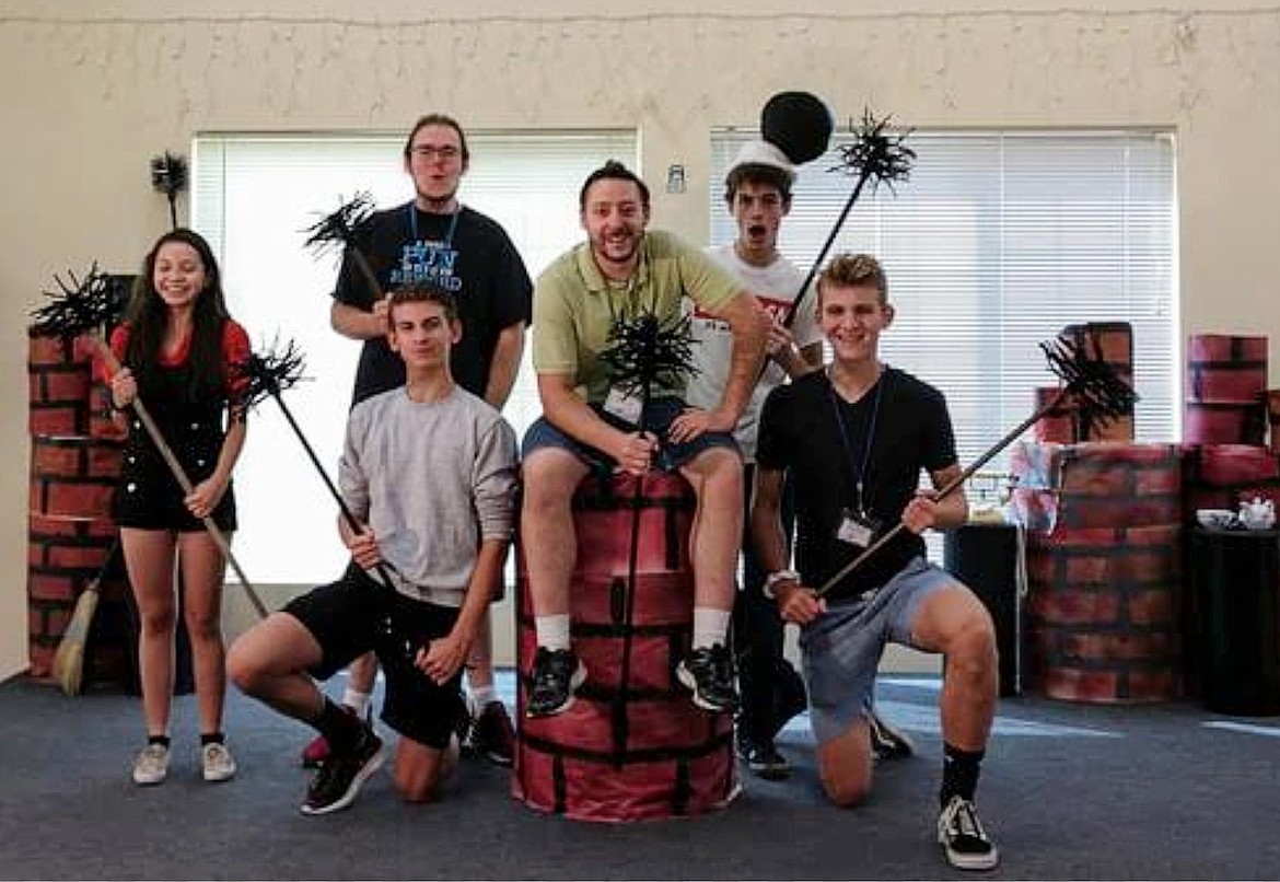 Izzy Mesenbrink, Kylen Braileanu, Jacob Simpson (kneeling), drama teacher Daniel Connelly, John Lowman and Michael Simpson have fun as chimney sweeps during the 2019 “Mary Poppins” summer theater camp.