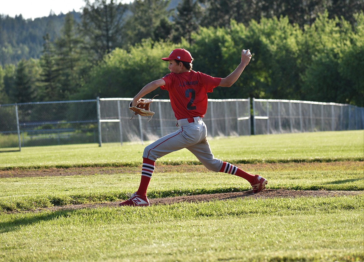 A Nationals player pitches the ball during Thursday’s championship game.