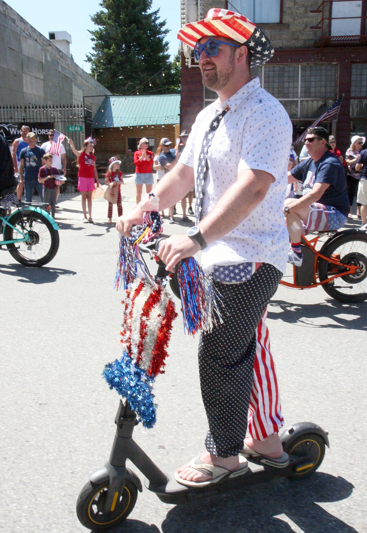 BILL BULEY/Press 
 Cory Yalowicki is dressed up in red, white and blue during the Fourth of July parade at Spirit Lake on Saturday.