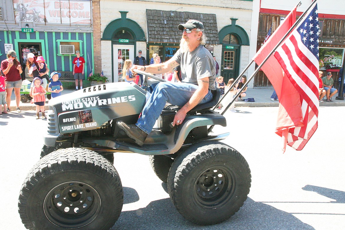 BILL BULEY/Press 
 Kevin Boeldt rides through the Fourth of July parade at Spirit Lake on Saturday.