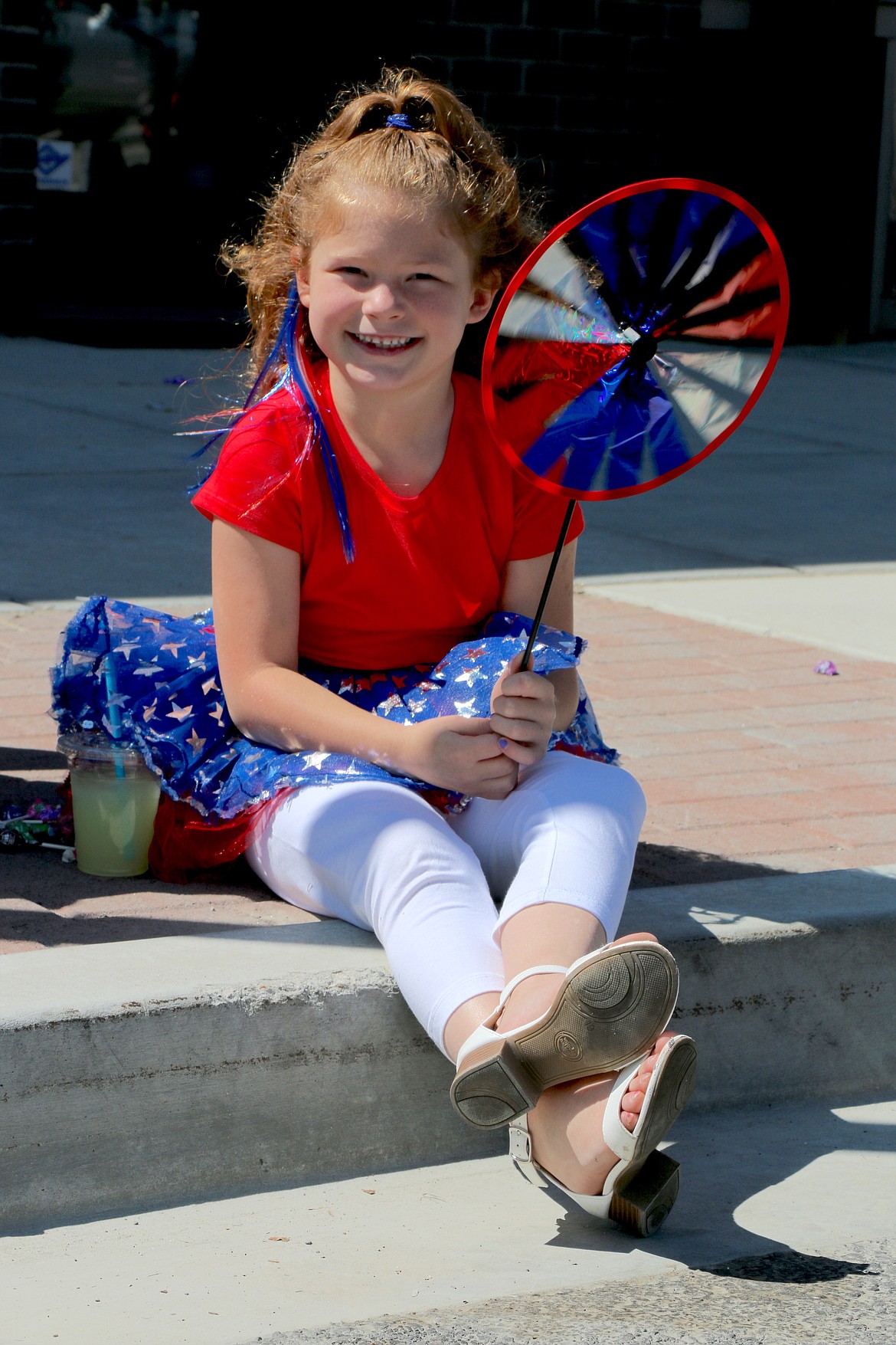 A young parade watcher has fun at Saturday’s Fourth of July parade in Sandpoint. Events were held by Save Independence Day Sandpoint after the Sandpoint Lions were forced to cancel their annual events due to the COVID-19 pandemic.