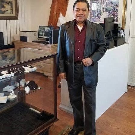 Courtesy photo 
 Owner and jeweler Angelito Marapao stands by a display case in the AquaGem jewelry store, located near Costo on the northeast corner of Government Way and Neider Avenue.