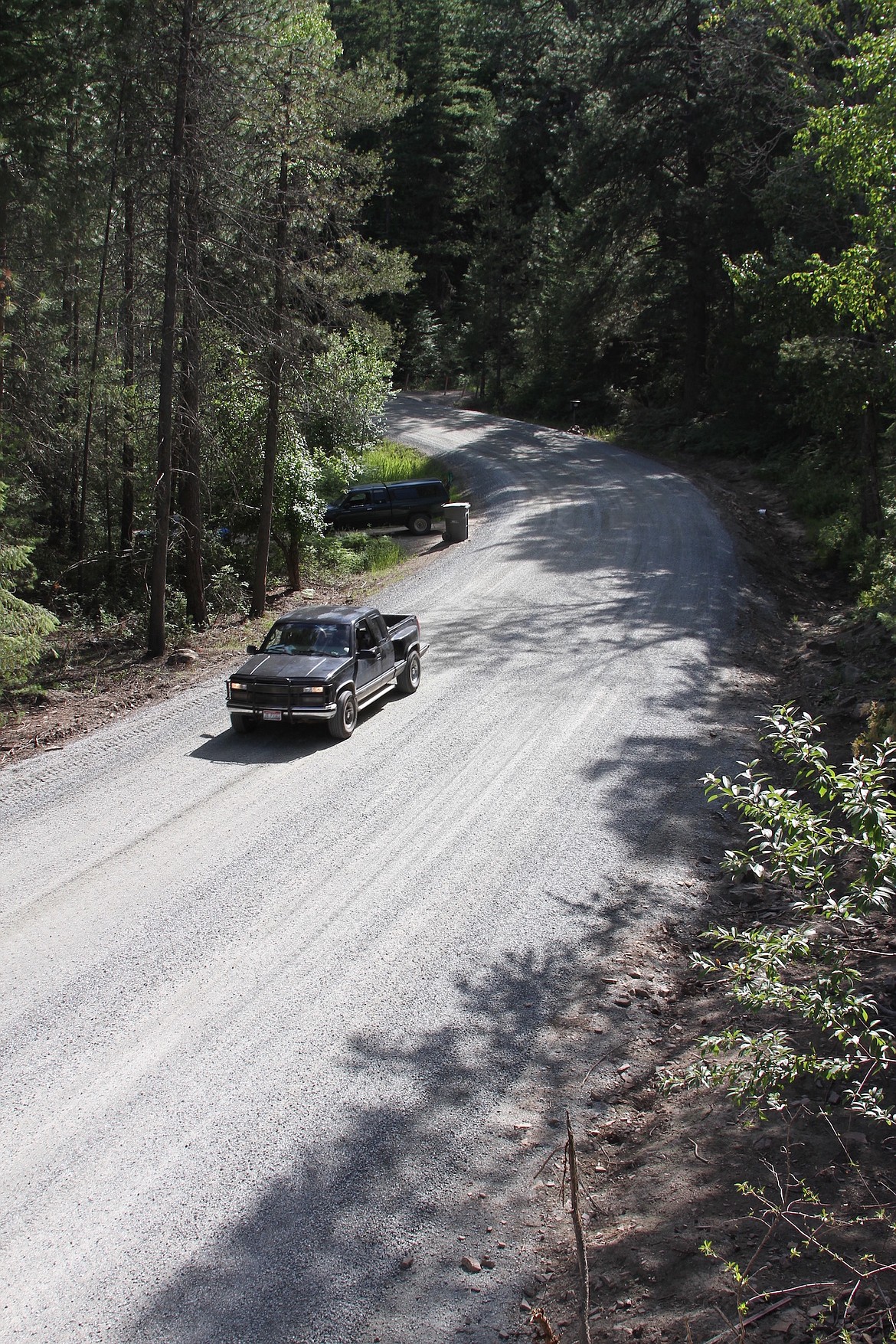 A motorists traverses a recently widened section of North Kootenai Road.
