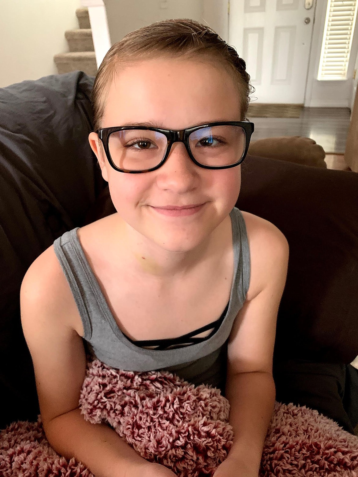 Incoming Woodland Middle School seventh-grader Tammi Hite is seen here five days after undergoing brain surgery. A benefit to help offset her medical costs will be held this coming Saturday.