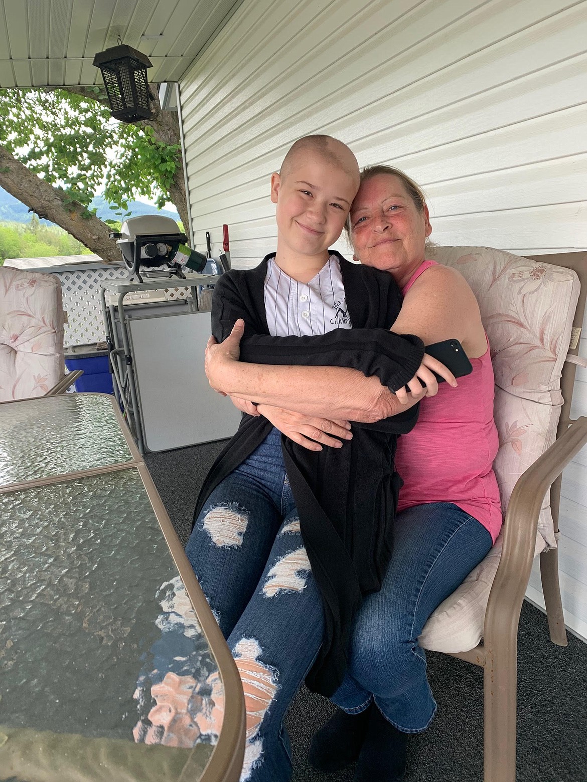 Tammi Hite,12, is seen here with her nana LaDonna Umland in this June 2020 photo. Tammi is a competitive cheerleader and math pro who is in the midst of treatment for brain cancer. An event to help with medical costs will be held July 25. (Courtesy photo)