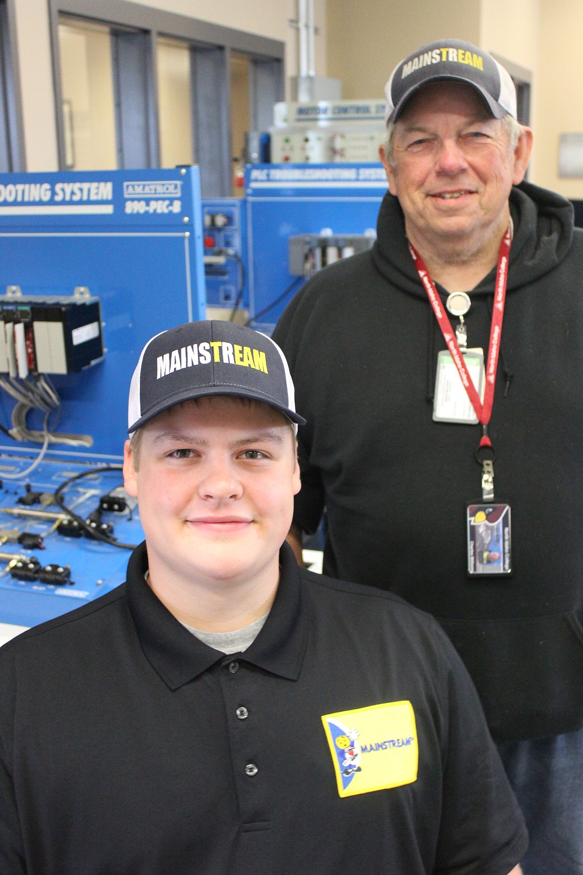 Jessen Day, 20, is pictured in front with Chuck Williams, 70, at a classroom in the North Idaho College Parker Technical Education Center. Day is participating in the NIC Workforce Training Center Apprenticeship program. Williams is an instructor in the program.